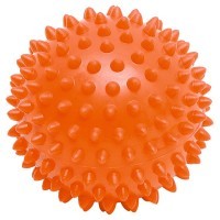 Ein orangefarbener Igelball mit Noppen zur Massage und Physiotherapie